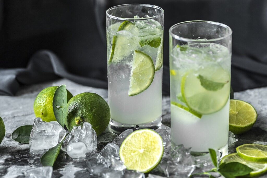 Caipirinha cocktail with lime on a table at a Rio beach kiosk