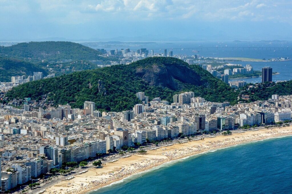 Ipanema beach with the Two Brothers mountain rising behind the sand