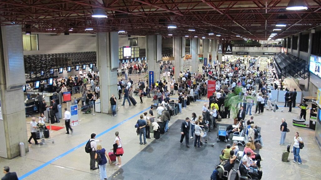 Passengers inside the international terminal at Guarulhos airport in São Paulo