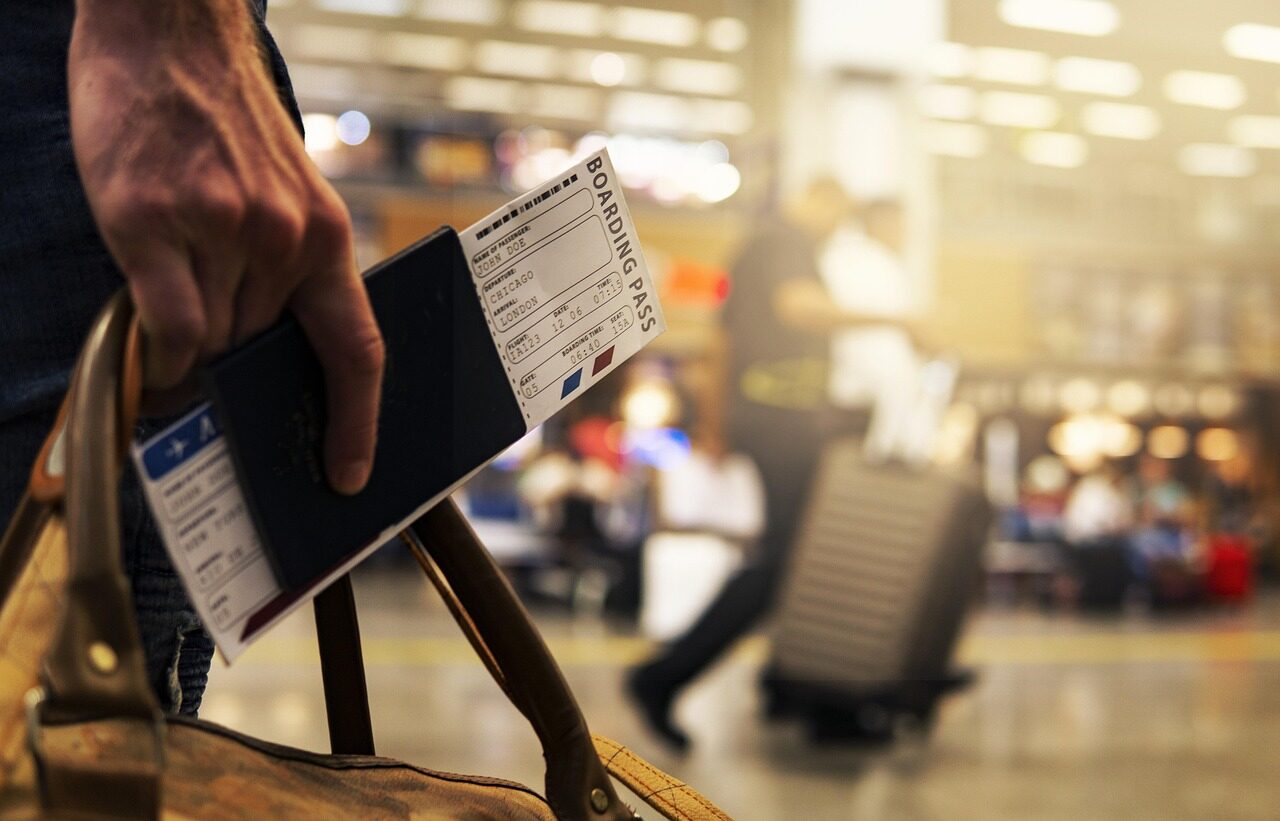 Passport and boarding pass illustrating Brazil entry requirements for Europe travelers at Rio airport