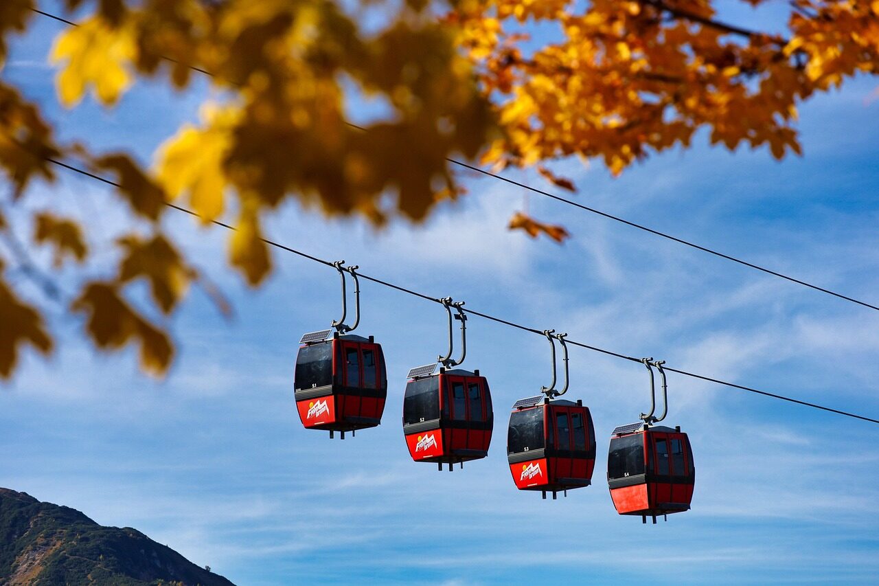 Red cable car gondola crossing between Morro da Urca and Sugarloaf Mountain