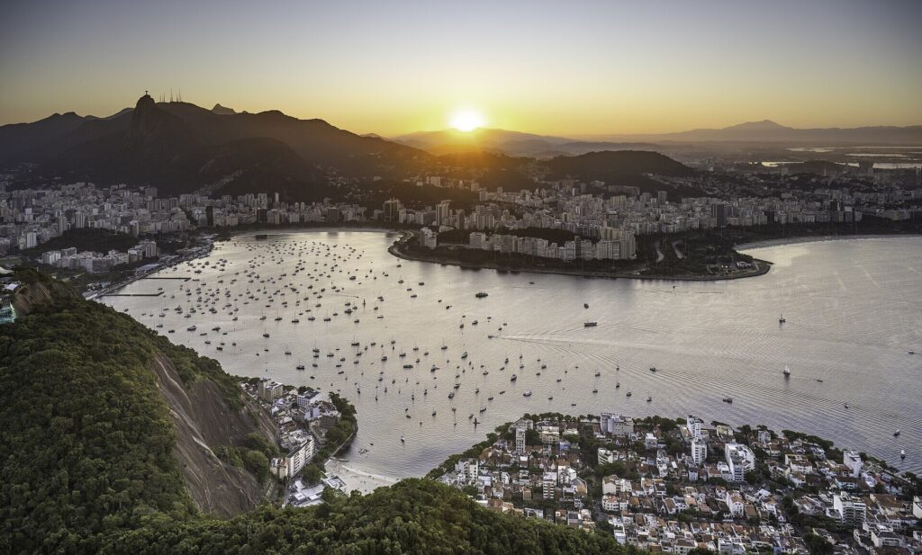 Sugarloaf Mountain rising above Botafogo bay and the Rio de Janeiro skyline