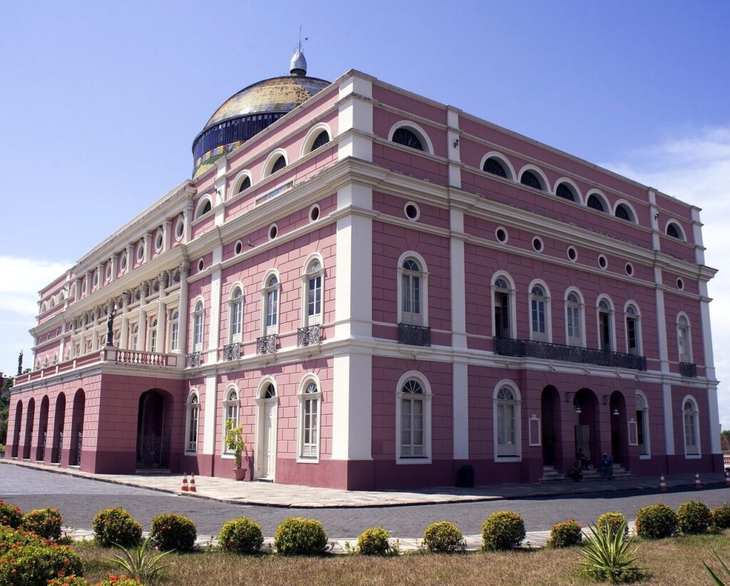 Teatro Amazonas opera house with its pink facade and tiled dome in central Manaus