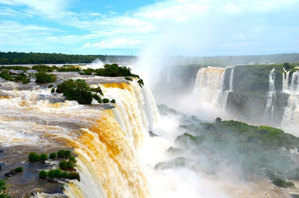 Visitors on a walkway above the thundering Iguazu Falls on the Brazil–Argentina border