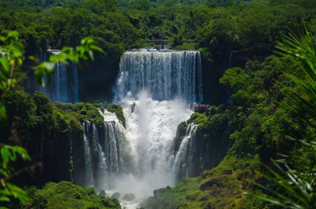 Visitors on the walkway above the thundering Iguazu Falls on the Brazilian side